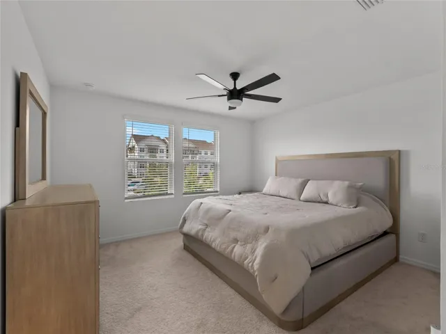 Spacious primary bedroom with walk-in closet and ensuite bathroom