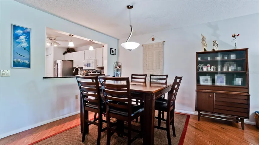 Dining area w/open view to kitchen