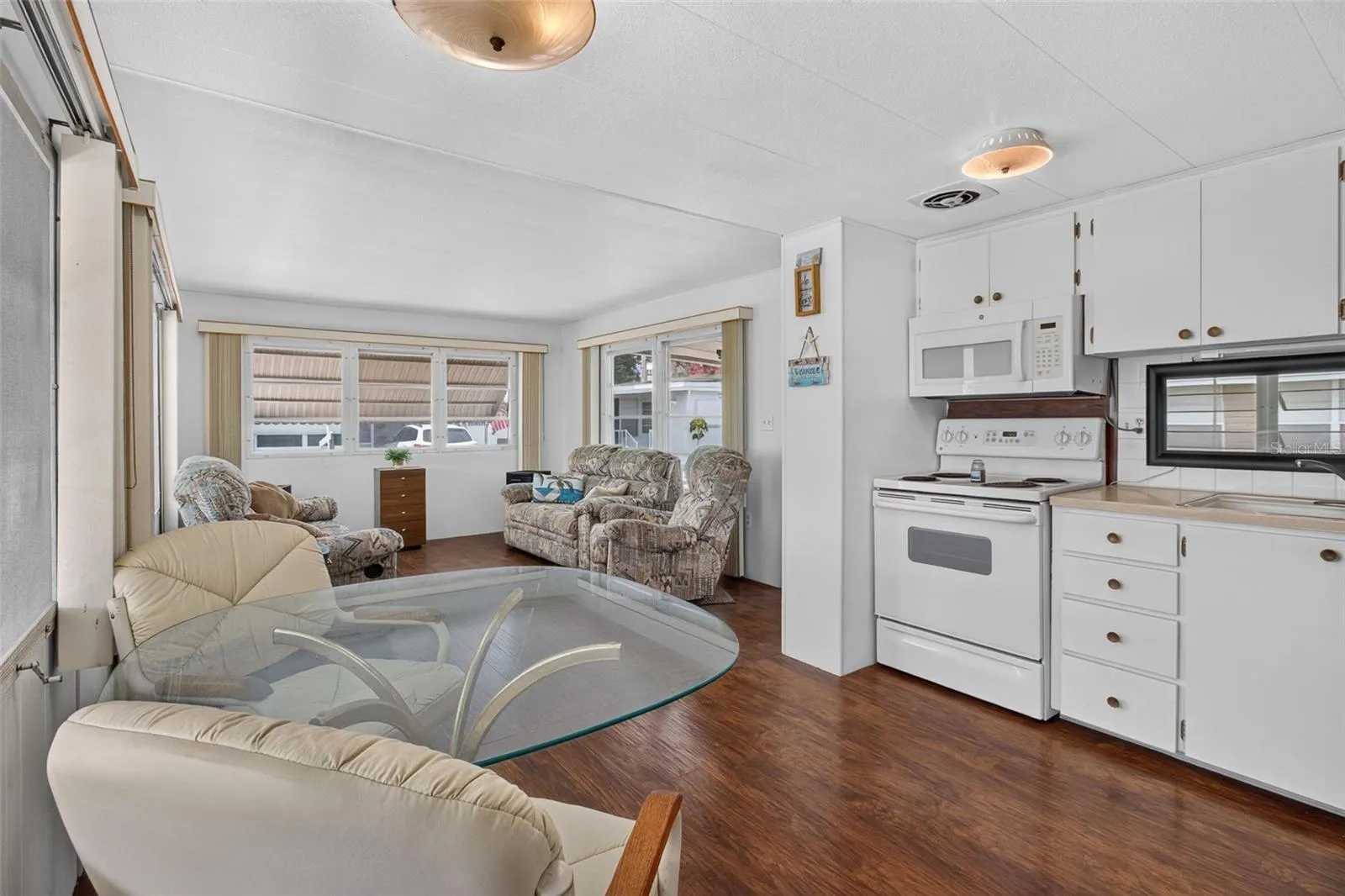 Original table and couches stay, kitchen chairs do not