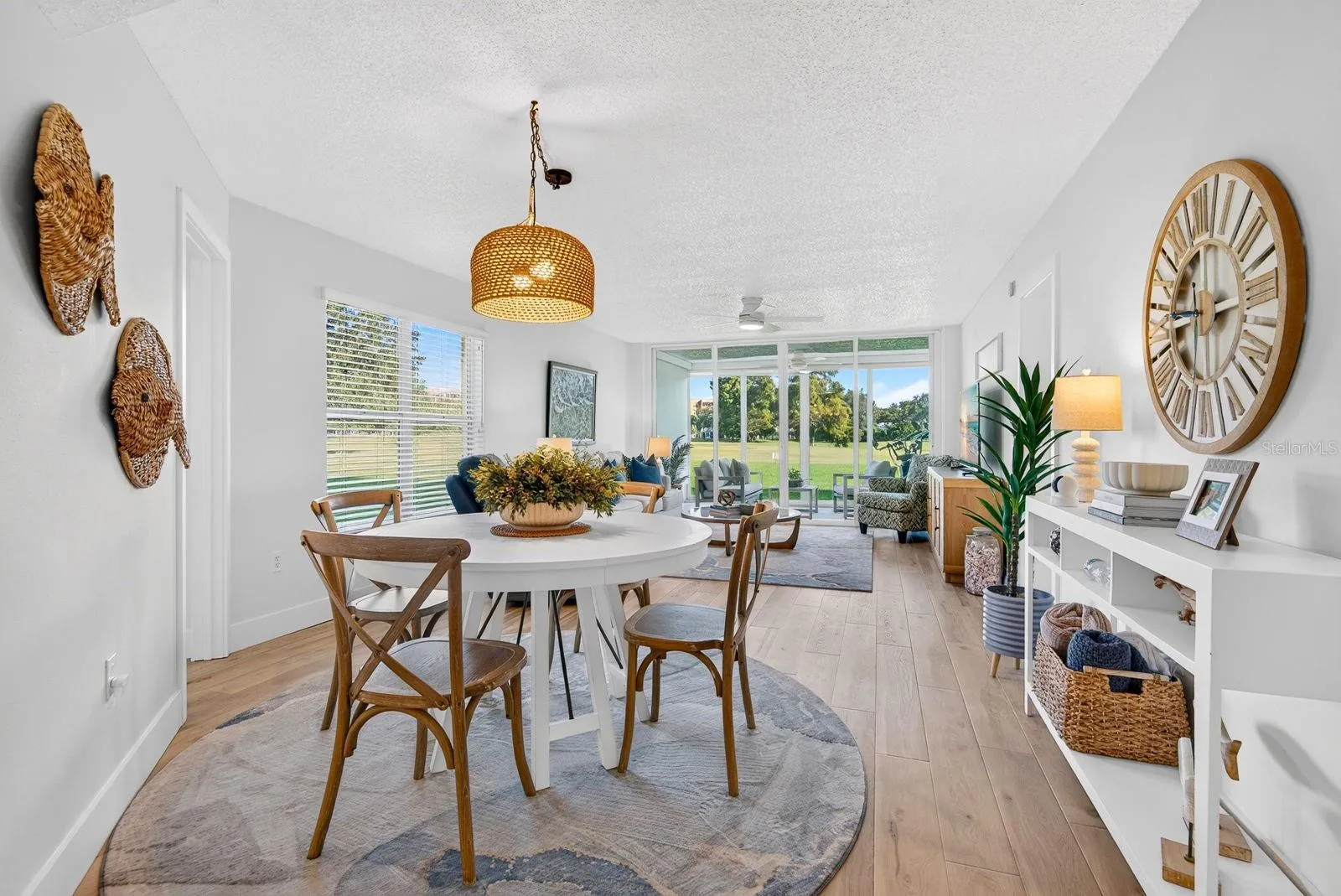 Dining area looking into living room area and lanai