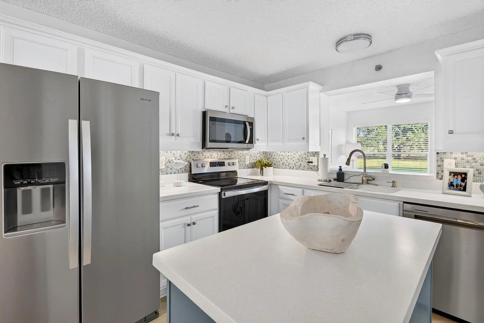 Beautiful Kitchen with opening to the bonus area