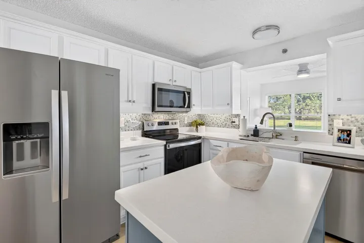 Beautiful Kitchen with opening to the bonus area