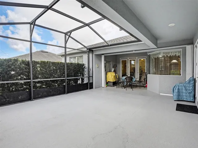 Screened-In Lanai with Hedges for Privacy