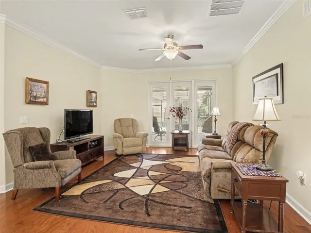 Formal Living Room with French Doors leading to the Lanai