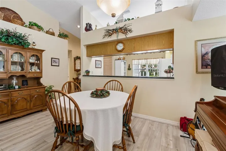 Dining room with view into kitchen