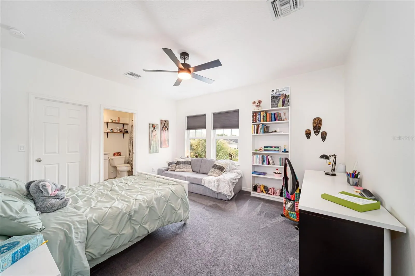 Spacious secondary bedroom with the convenience of a private en-suite bath.