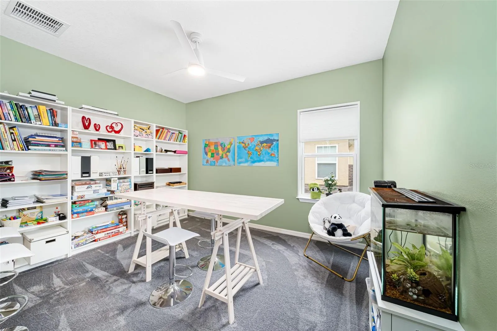 Versatile additional bedroom currently set up as a dedicated homework and study space.