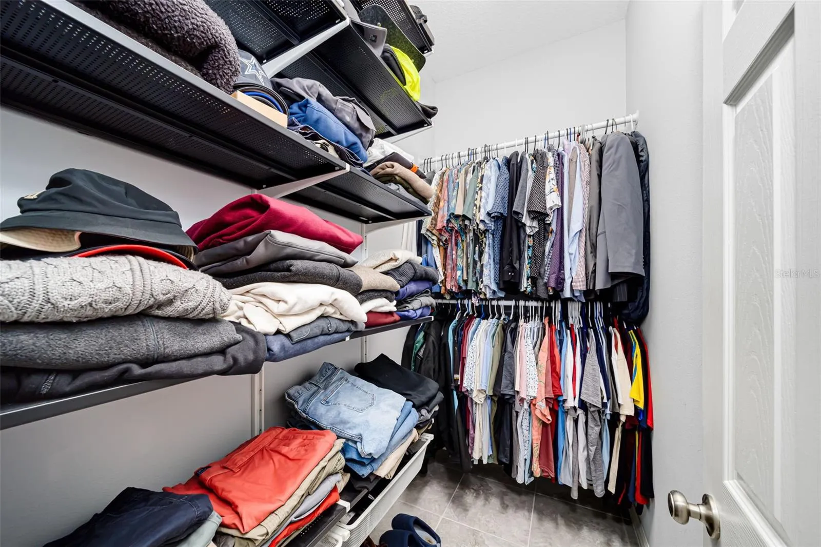 Enjoy the convenience of dual walk-in closets with dedicated storage for two.