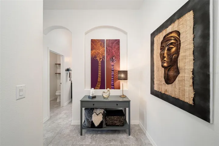 Privately situated primary suite conveniently located on the first floor.