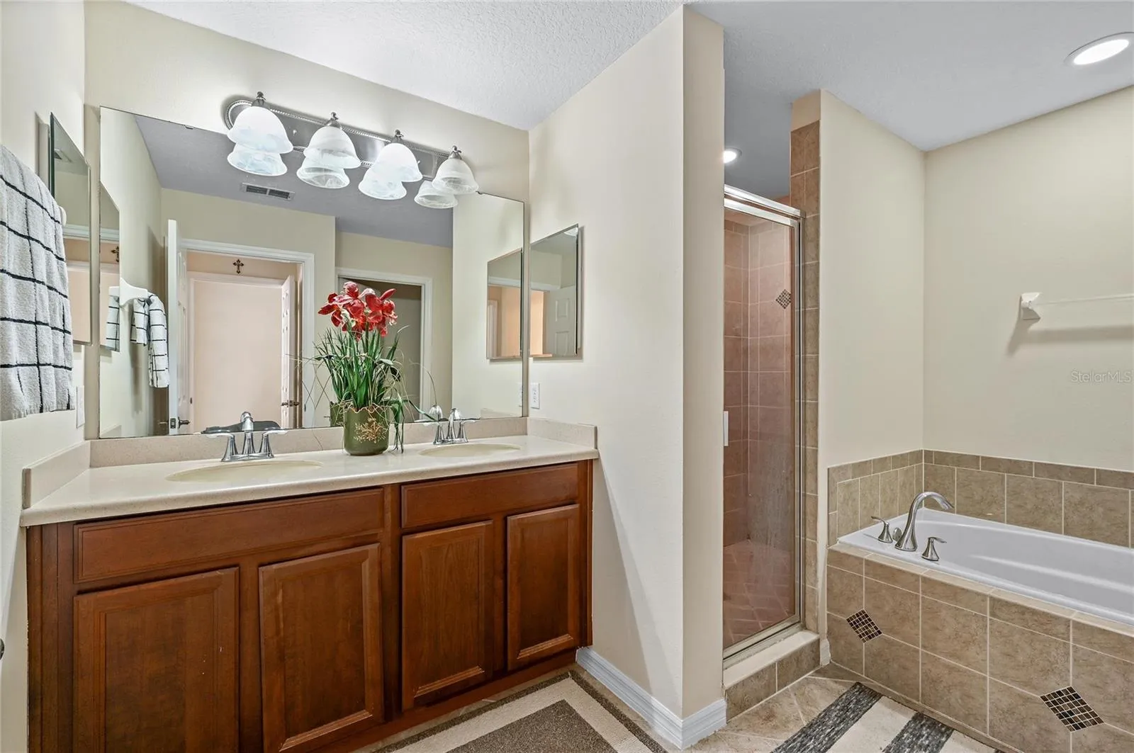 primary bath suite...double vanity jetted soaking tub and walk in shower