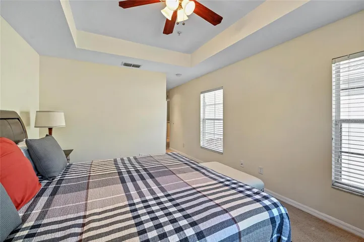 primary bedroom with walk in closet