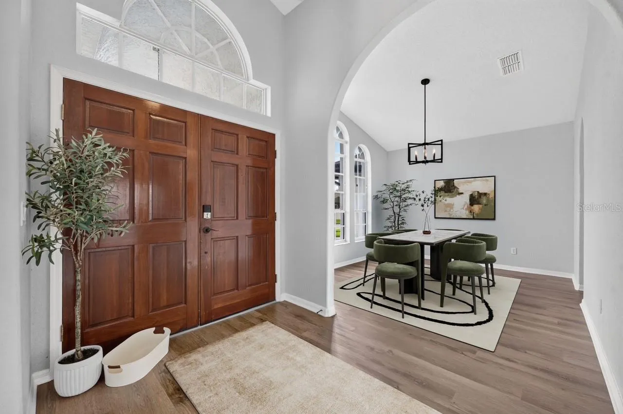 Staged foyer and dining room