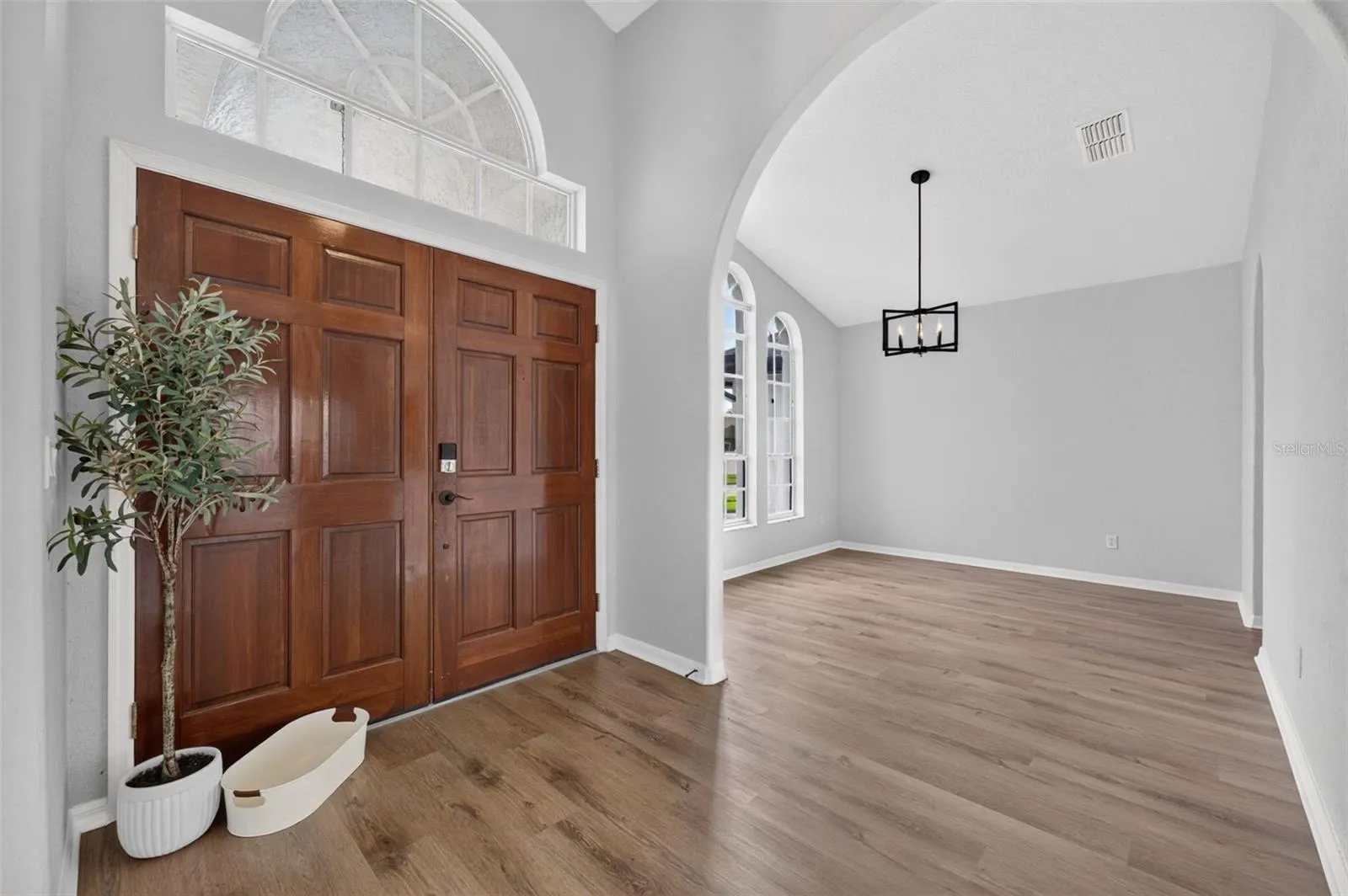Vacant foyer and dining  room
