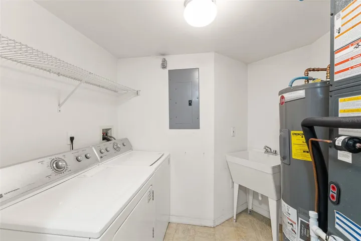 Laundry Room with HVAC 2024, Water Heater 2025, Utility Sink