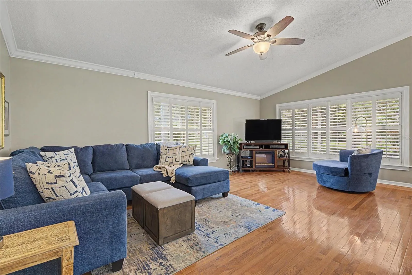 Large family room with neutral color palette