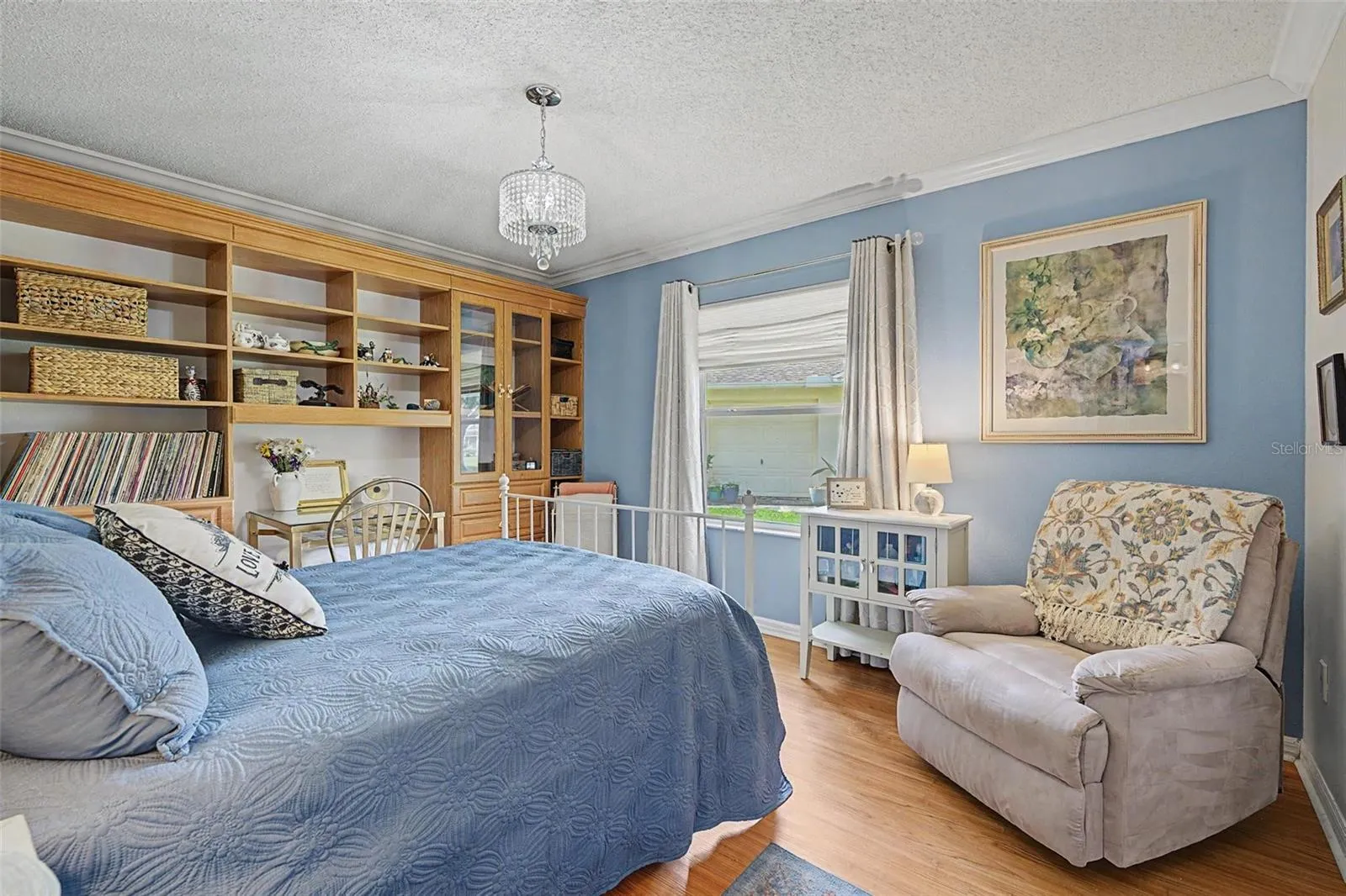 Bedroom 2 with a wall of custom built-ins