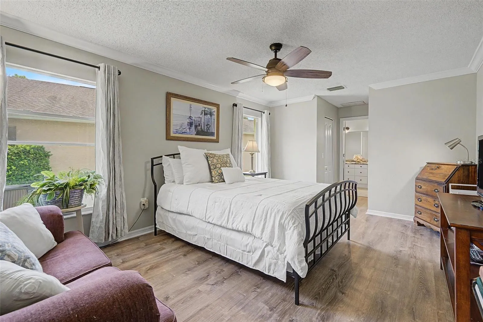 Master bedroom with easy-care LVP flooring