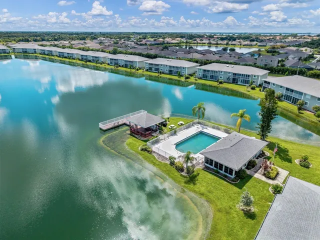 LAKEFRONT COMMUNITY CENTER WITH POOL PAVILION AND FISHING PIER