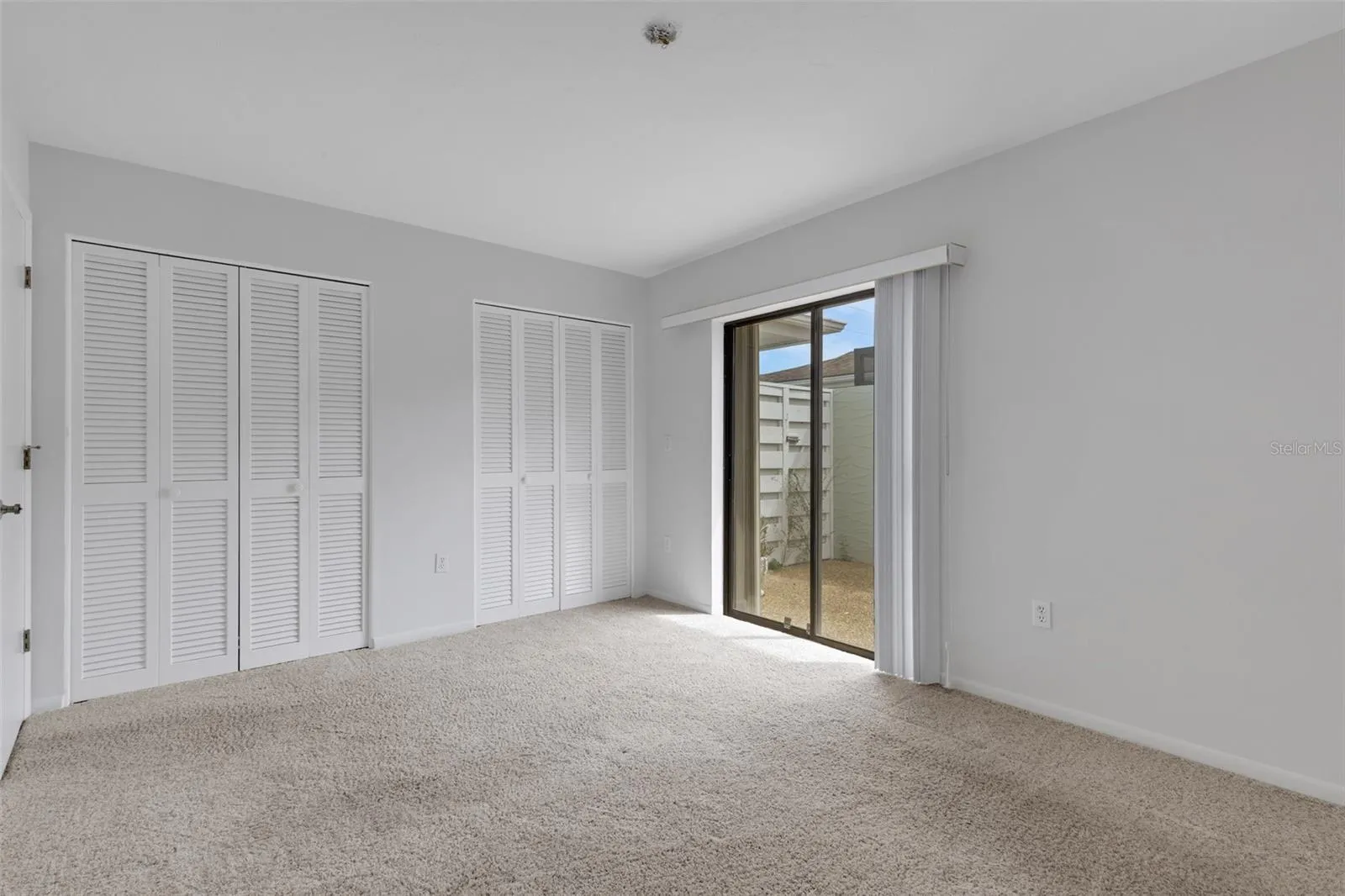 Second Bedroom - Wall of Built-in Closets