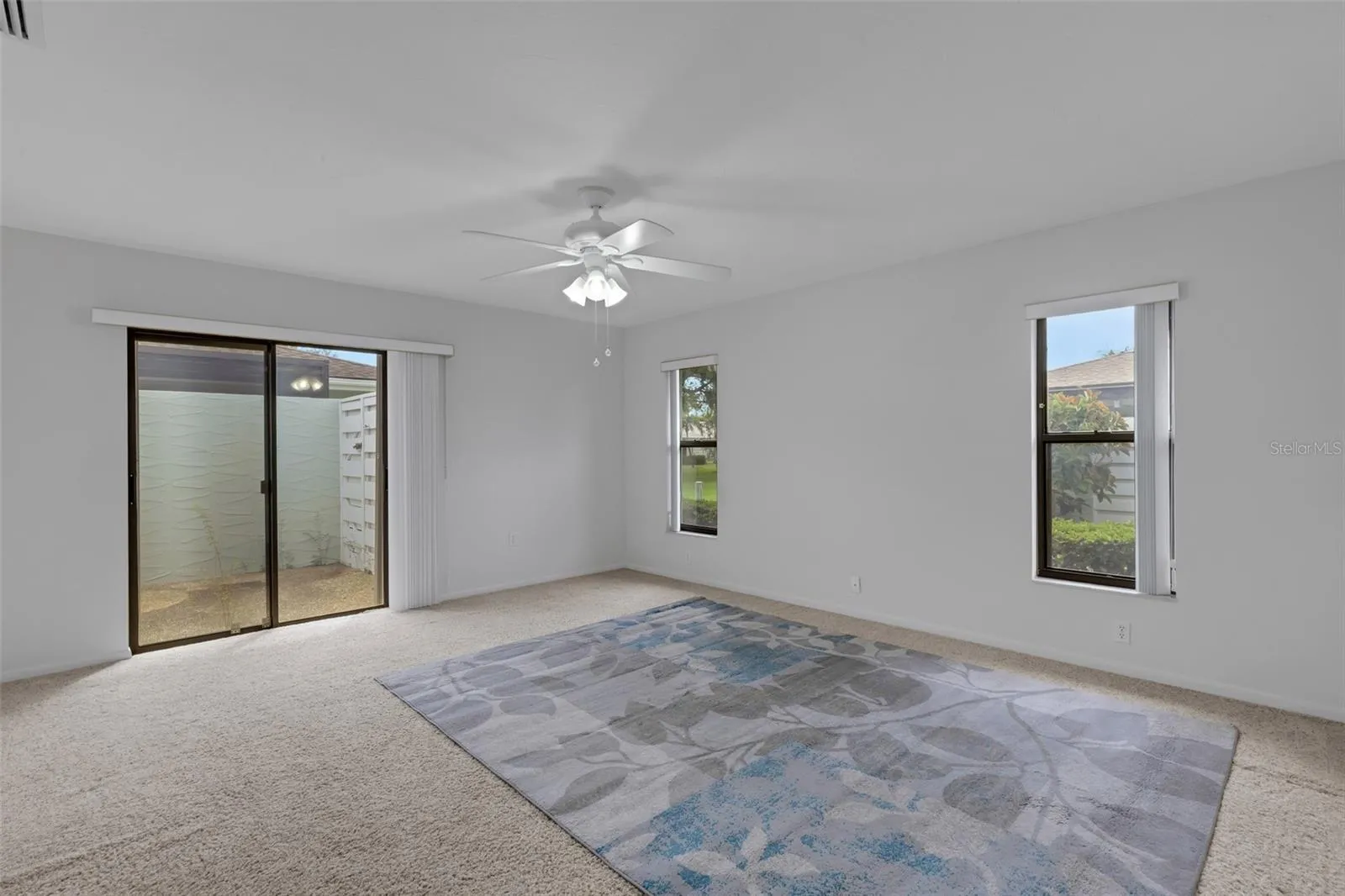 Primary Bedroom - Sliders to Courtyard Lanai
