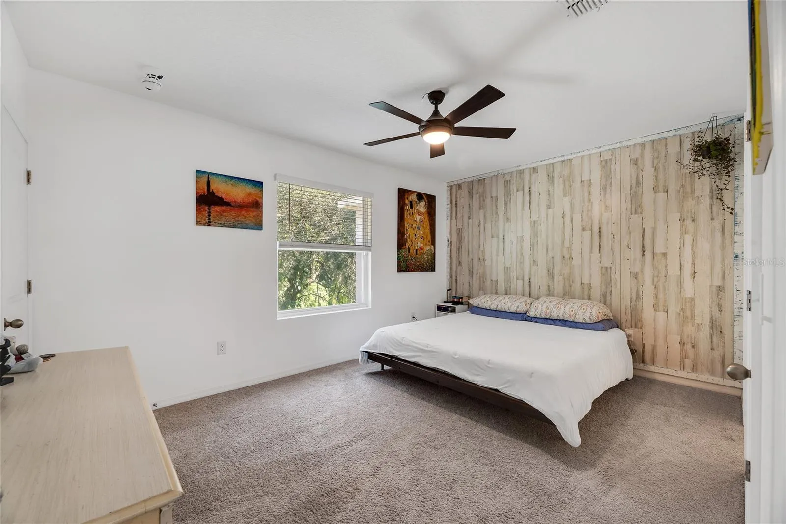 The spacious Owner's Suite features an updated ensuite bath and two walk-in closets.