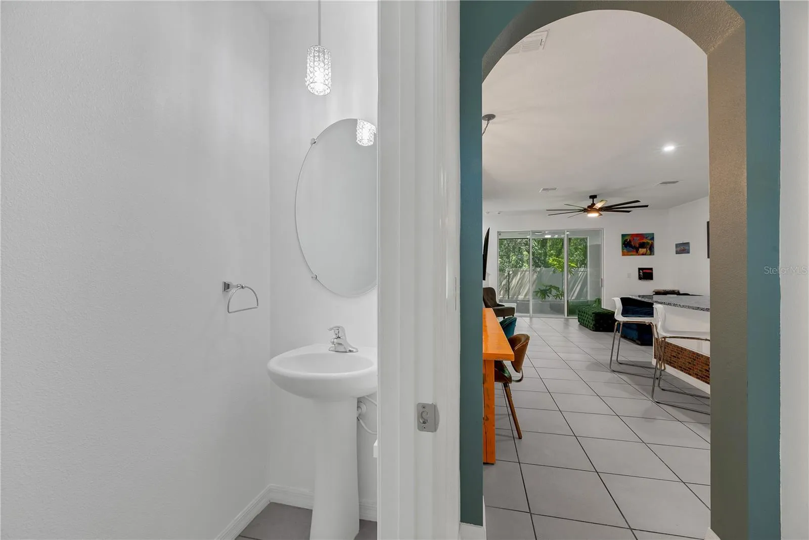 Downstairs, off the front foyer is a convenient half bathroom for guests.