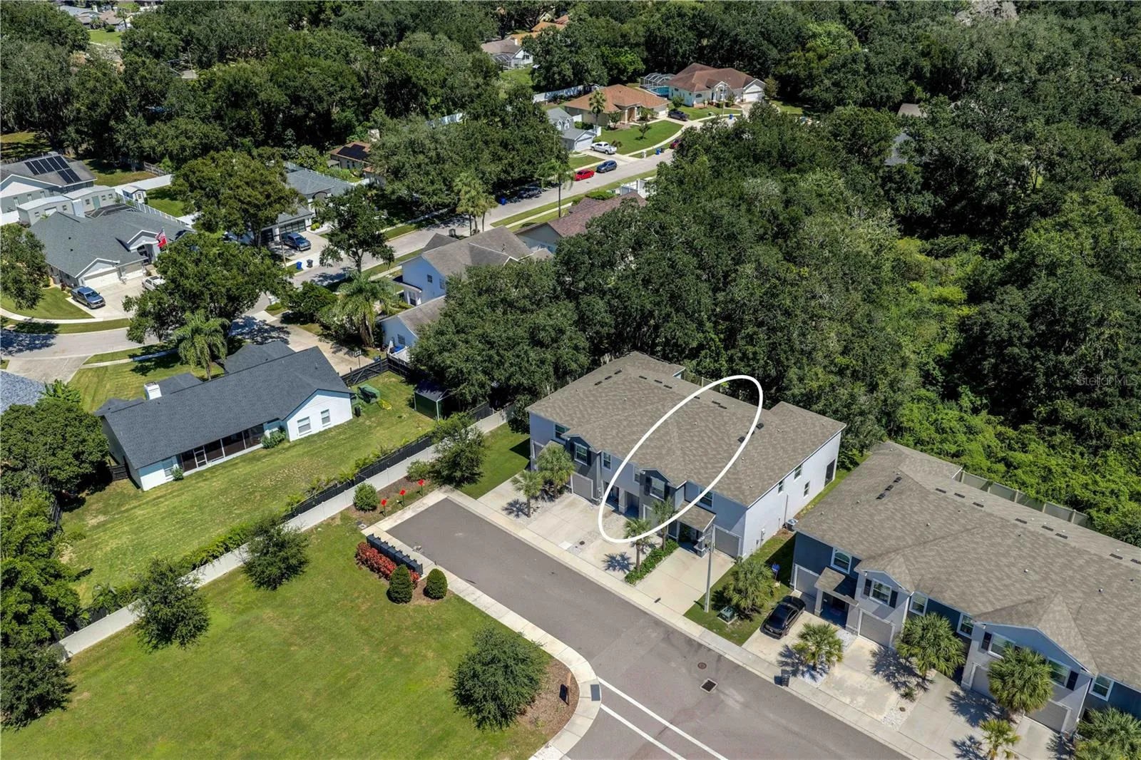 Aerial view of townhome right across from the community mailbox.