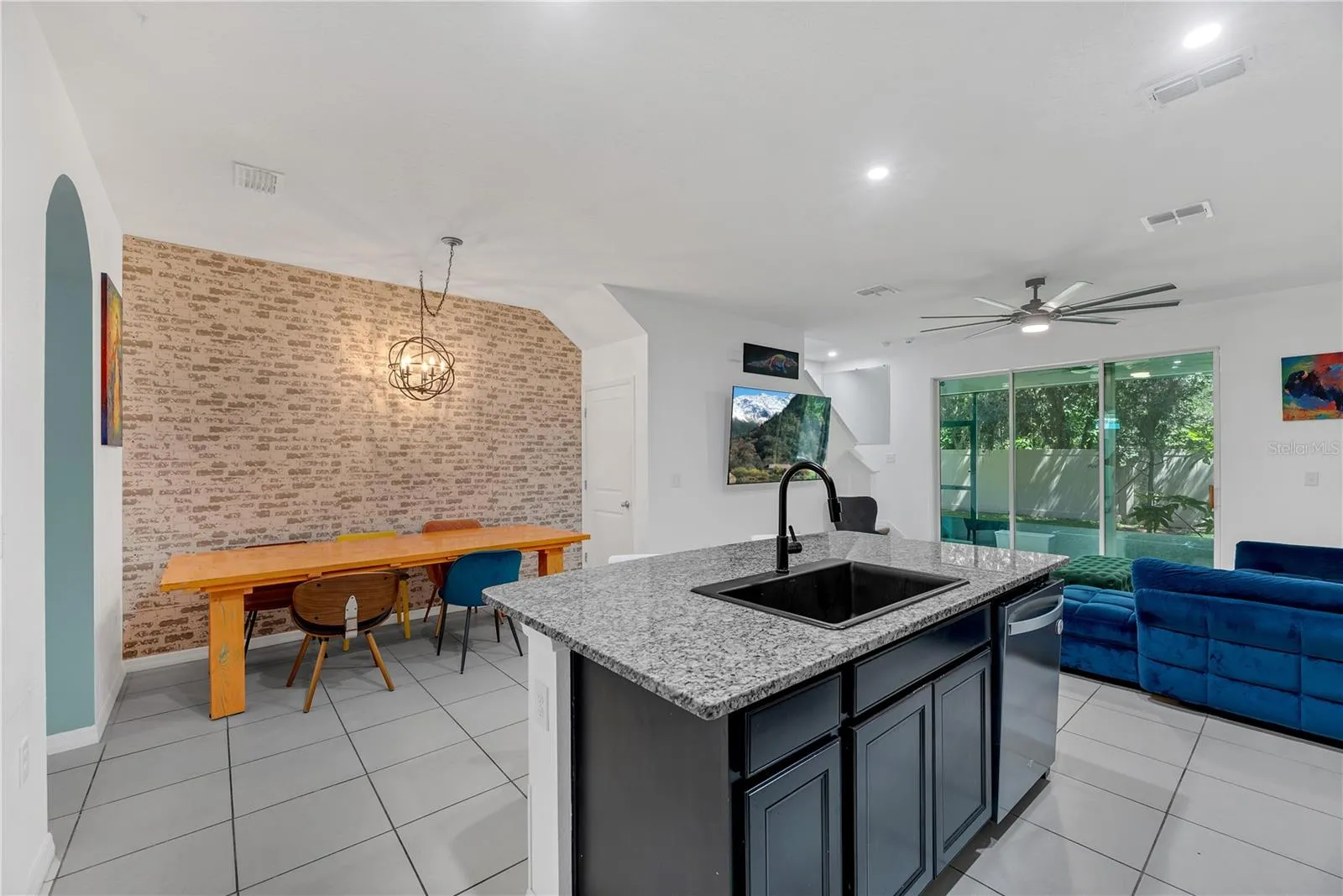 There is a foe brick feature wall in the dining area and a large under-stair storage area.