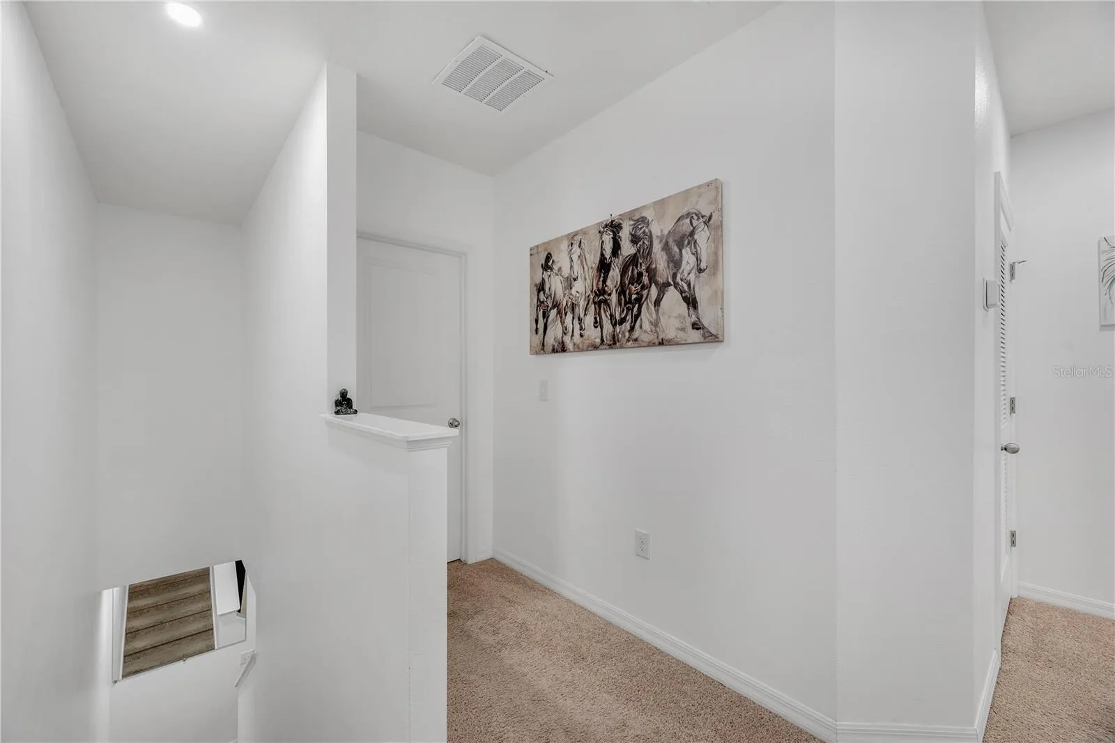 The second-floor landing has room for a shared office or homework station and the Primary Suite thoughtfully positioned away from the two secondary bedrooms.