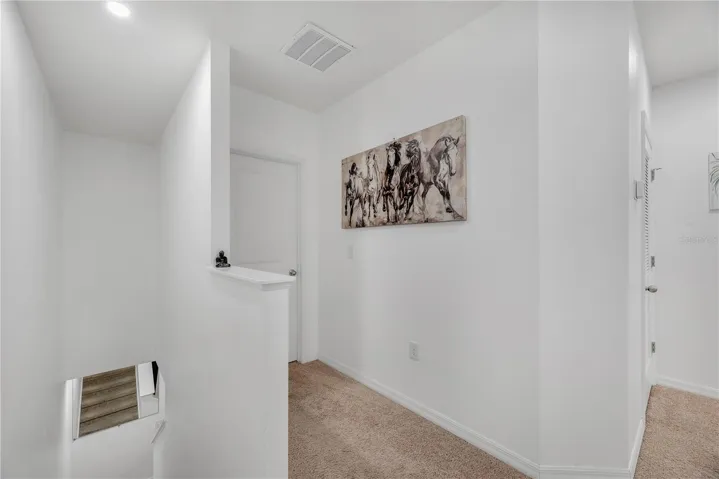 The second-floor landing has room for a shared office or homework station and the Primary Suite thoughtfully positioned away from the two secondary bedrooms.