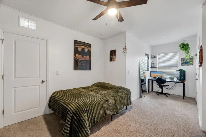 Spacious bedroom # 3 shares a full bathroom and has a standard closet.