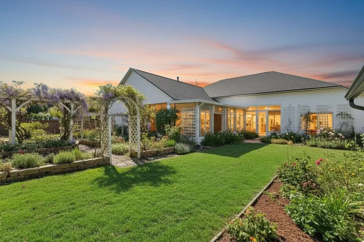 Virtually Changed to show backayrd potential with existing flower beds and added landscaping.