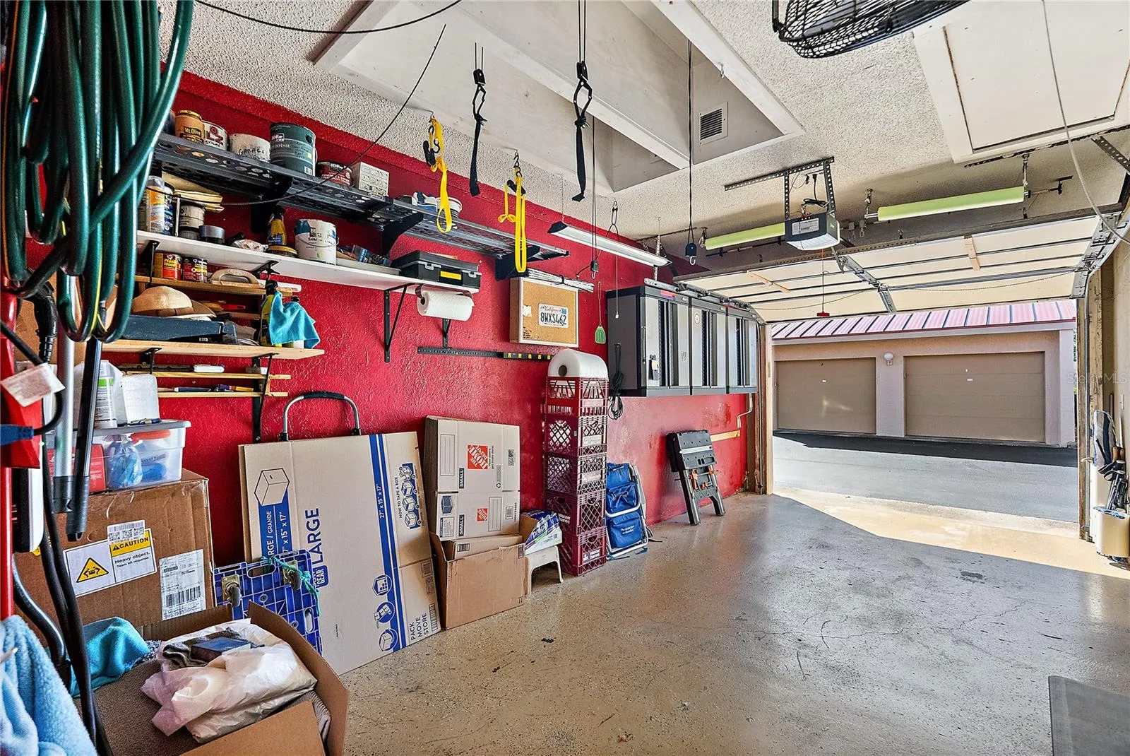 One car garage with stroage and EV charger.