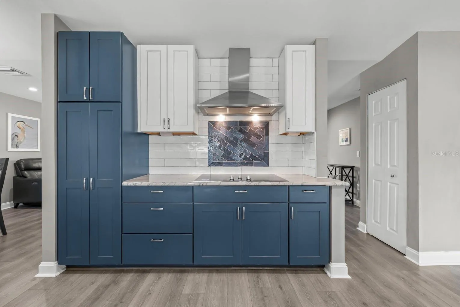 Multiple access points to the kitchen. Plenty of cabinet space!