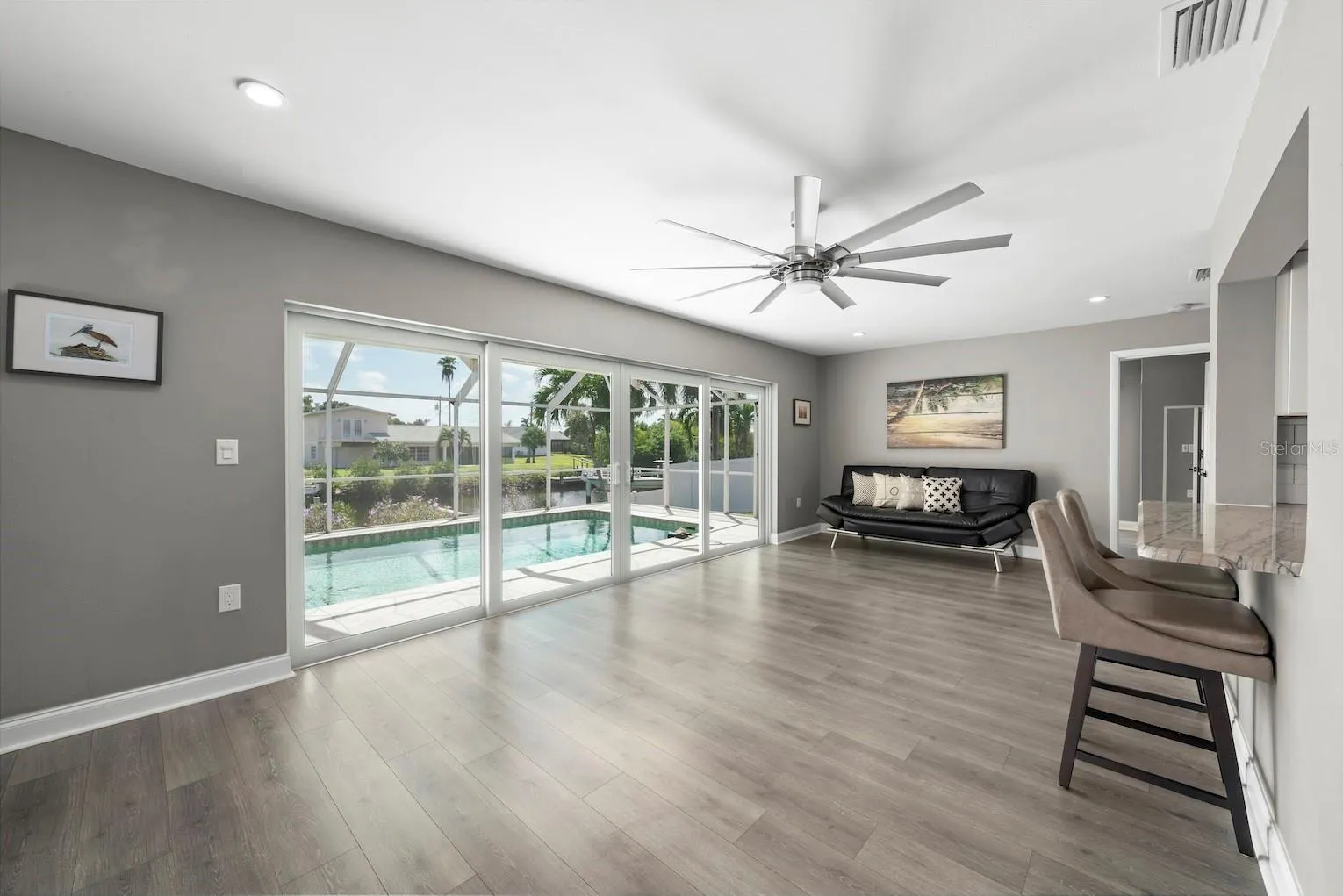 Impact sliders (shown closed) leading to the lanai / pool area.