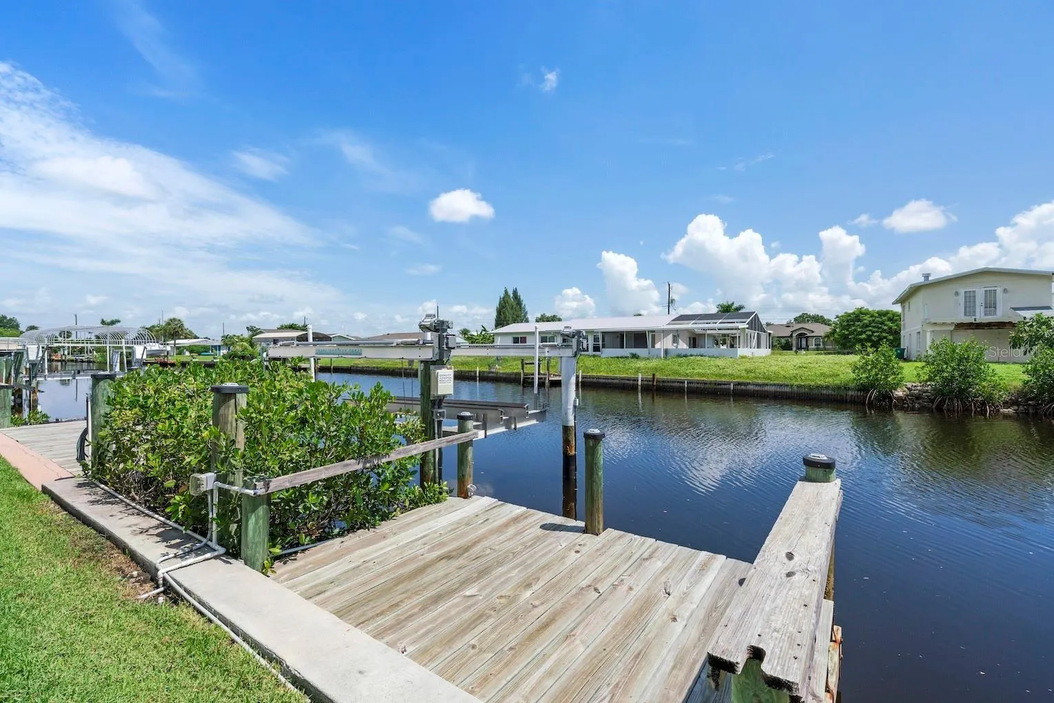 Illustrating private dock with boat lift.