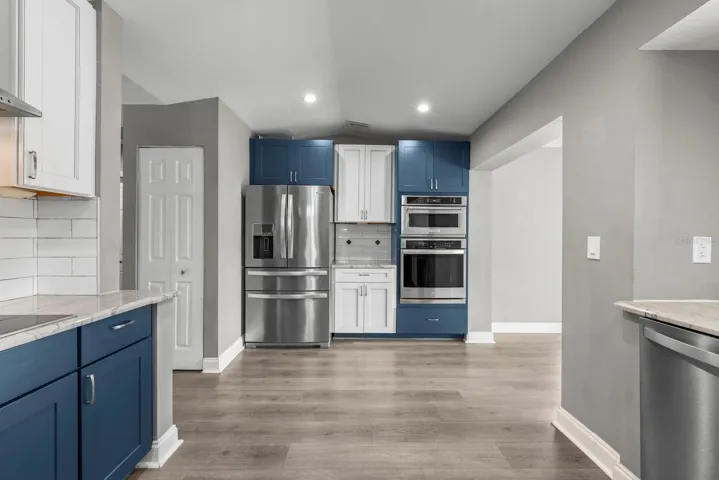 Wall oven, microwave, and high end refrigerator.