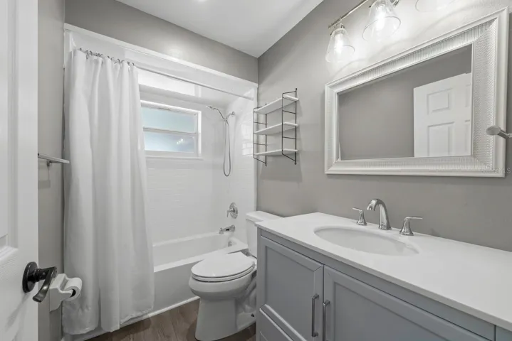 Guest bathroom with shower/tub combo.
