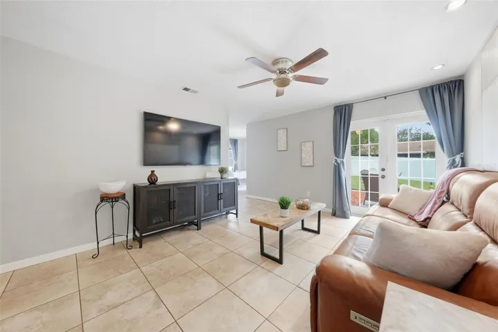 Enjoy watching your relaxing in your Living Room with the Double Doors open and the cool breeze!