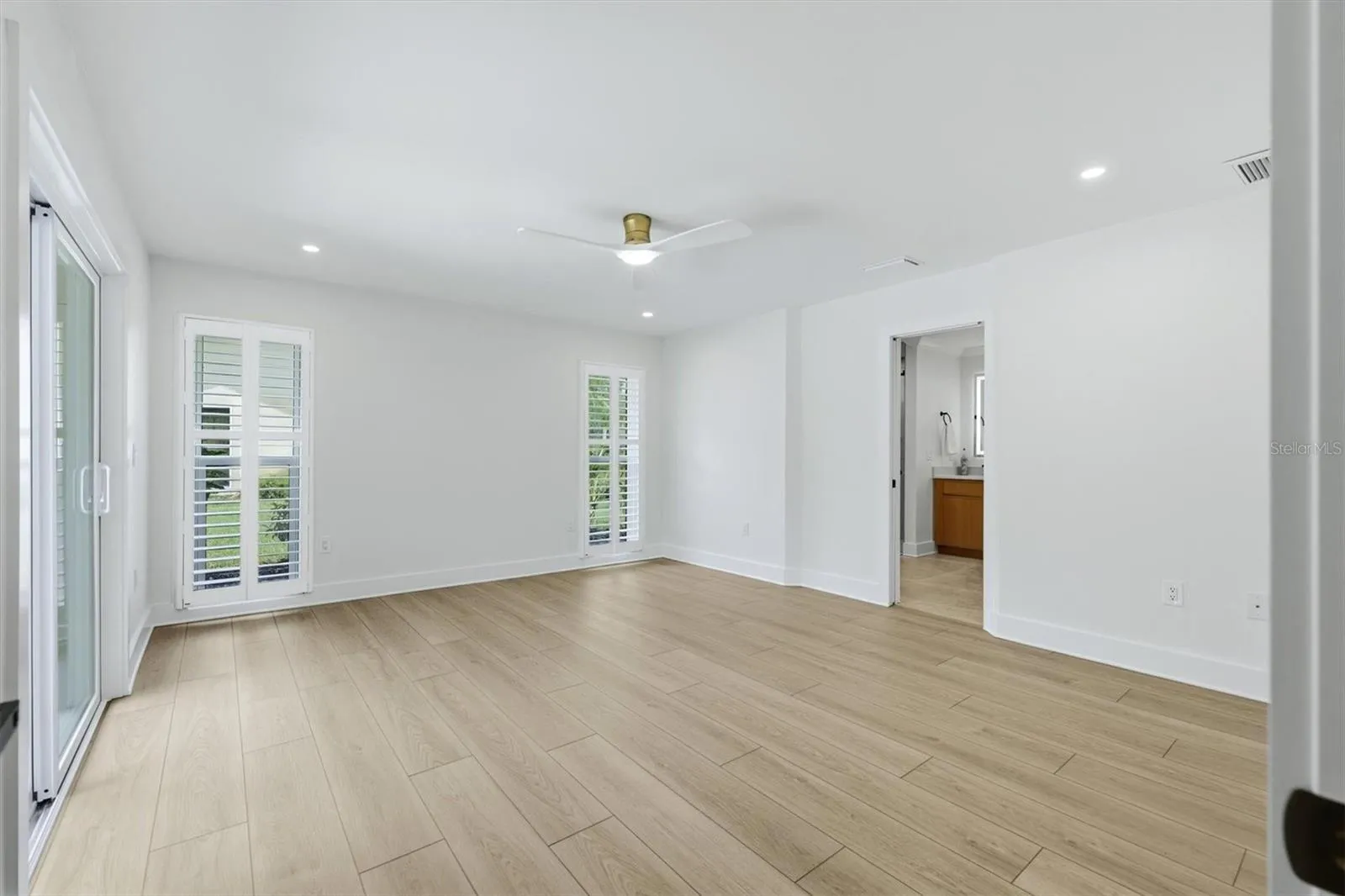 Access to Lanai and Pool from Primary Bedroom