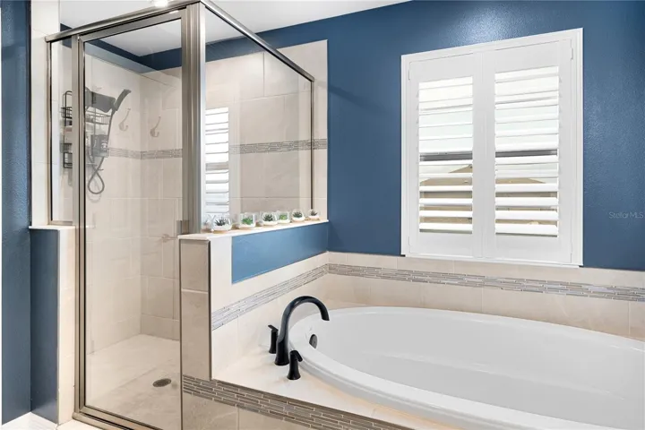 Soaking tub in primary ensuite