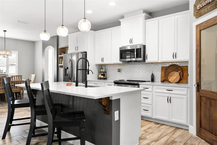 Breakfast bar in this stunning galley kitchen