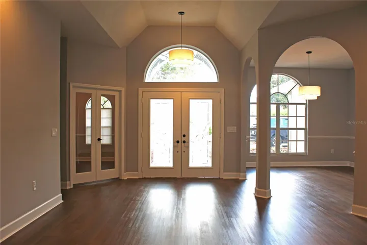 Front entrance showing dining room &amp; office