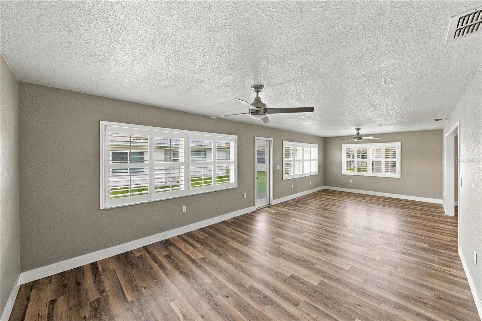Family Room w/ Plantation Shutters