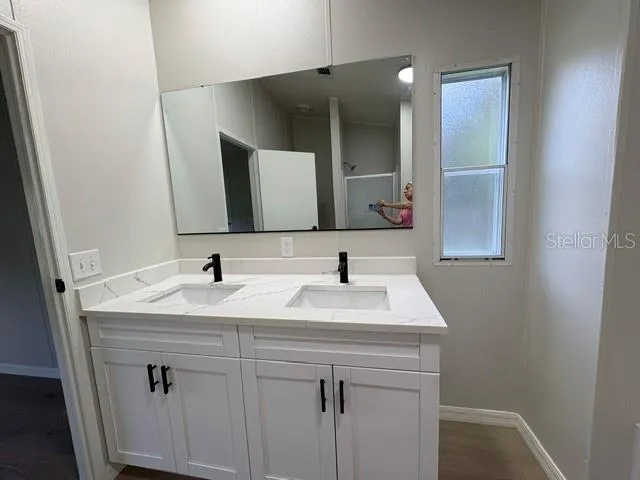 Primary BathroomDual SinksGranite topsBrand New soft close cabinets