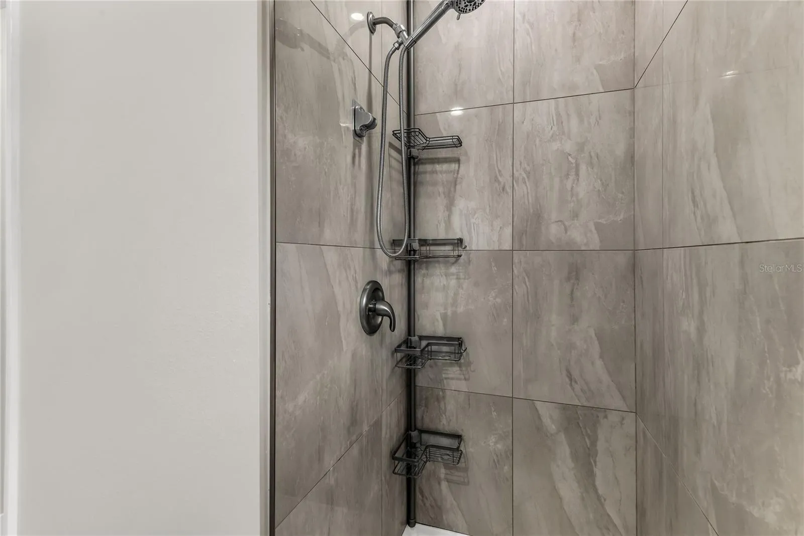 Primary bath modern tiled standalone shower