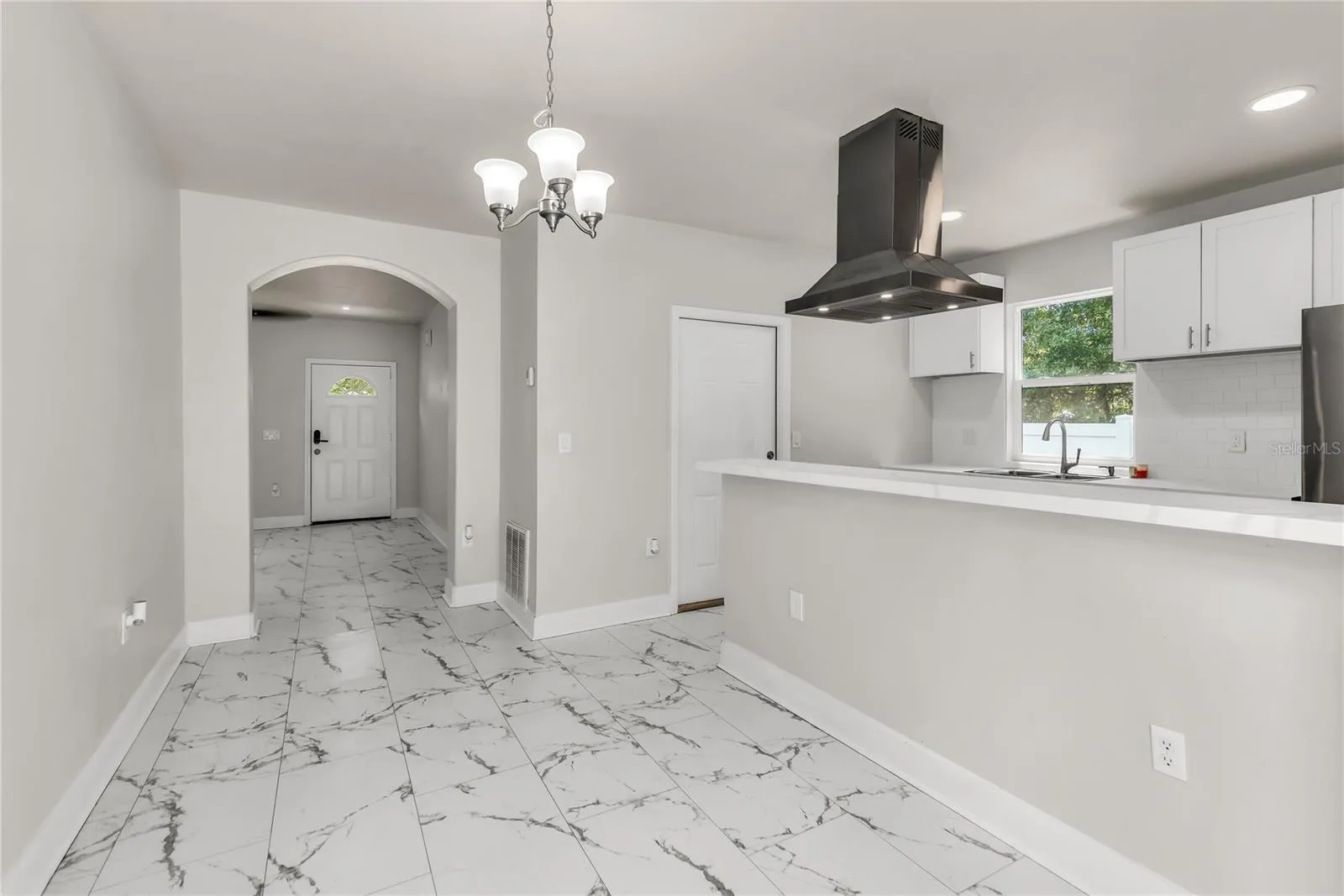 Kitchen overlooks Dining Room