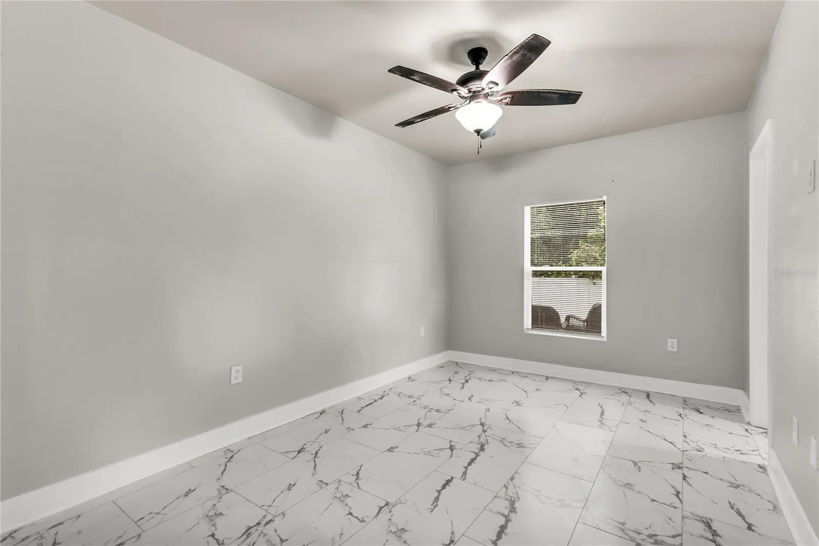 Primary bedroom with walk-in closet and ensuite bath