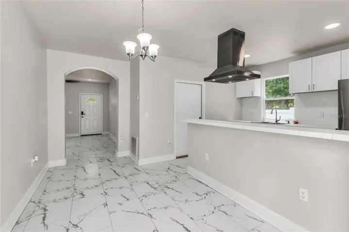 Kitchen overlooks Dining Room