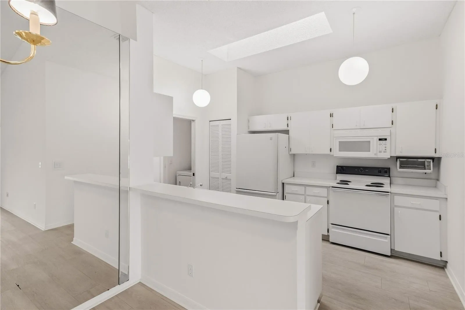 Kitchen featuring an eating bar, perfect for casual meals